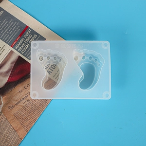 Macro detail of baby footprint silicone mold with two cavities for resin crafts