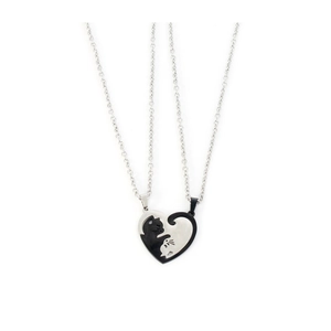 Detailed view of cat-shaped puzzle heart necklaces in silver and black polished finish