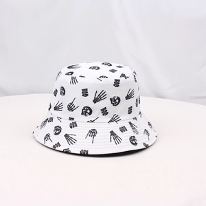White sun bucket hat with black skull print and BOO lettering for outdoor protection