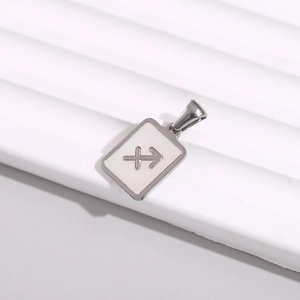 Detail of square stainless steel necklace featuring a Sagittarius zodiac sign inlay