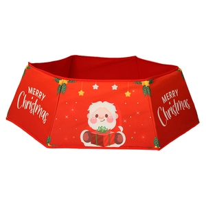 Detail of red hexagonal Christmas tree collar with Santa Claus and Merry Christmas print