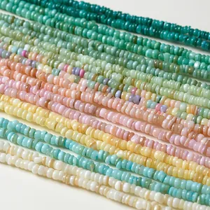 Detailed macro view of colorful flat disc natural shell beads for DIY jewelry making