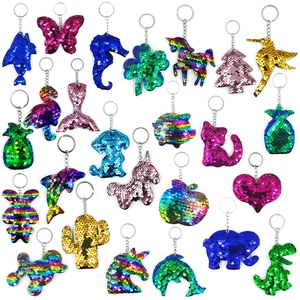 Detailed assortment of flip sequin keychains in various animal and plant shapes