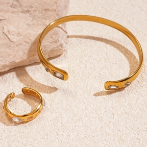 Golden stainless steel sun droplet open bangle and ring set with sparkling zircon stones