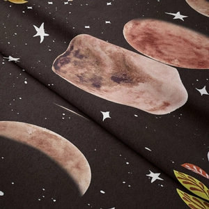 Macro detail of soft bohemian tapestry fabric with brown moon phase watercolor pattern