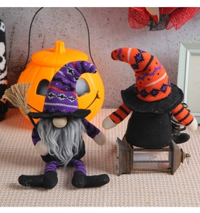 Halloween gnome plush set with purple witch hat and broom beside spooky pumpkin lamp