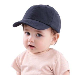Front view of a navy blue cotton baseball cap for kids on a toddler model, plain style