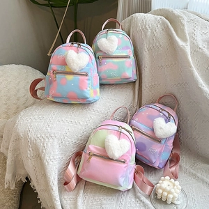 Mini macaron gradient backpacks with plush heart charms in stylish pastel colors
