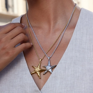 Starfish pendant necklaces in gold and silver finish with twisted rope chains on model