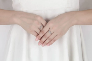 Detailed view of silver minimalist rings for couples featuring a crystal pave design