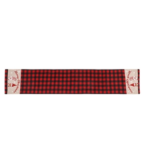 Christmas table runner with red and black buffalo plaid and gnome Merry Christmas design
