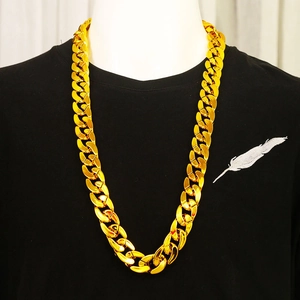 Bold hip hop chunky gold Cuban link chain necklace displayed on a male mannequin