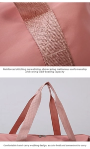Detail of reinforced stitching on the pink travel bag handle for heavy-duty support