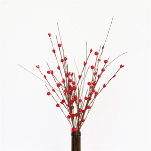 Artificial red berries branch for Christmas and New Year festive home table decoration