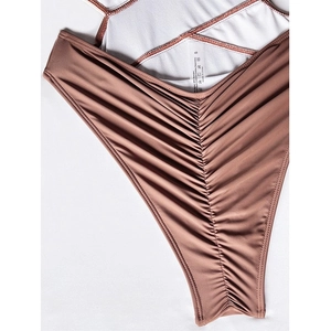 Detail of mauve high waist swimsuit bottom with V-shape pleats and soft lining