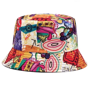 Detail of vibrant street graffiti pattern on a cotton bucket hat with bold colorful art