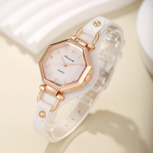 Montre à quartz chic pour femme avec boîtier hexagonal or rose et bracelet cuir à clous