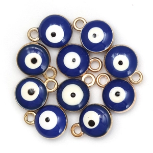 Macro detail of 10-piece gold-rimmed blue evil eye charms on a plain white background