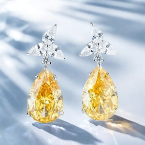Elegant 925 silver earrings featuring yellow teardrop stones and floral diamond clusters