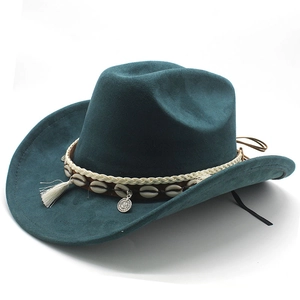 Detail of dark green felt cowboy hat with shell-adorned leather band and fringe trim