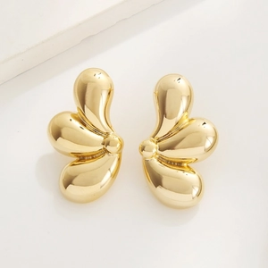 Minimalist gold petal-shaped geometric drop earrings with polished metallic mirror finish