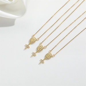 Vintage gold plated religious necklace set with Virgin Mary relief and cross charms