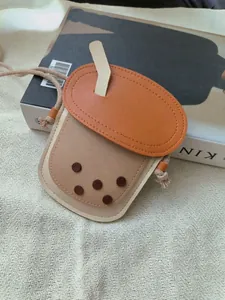 Cute milk tea shaped children's crossbody bag made of premium PU leather with woven strap