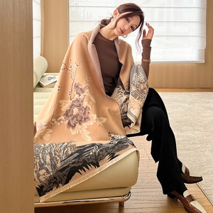 Detail of vintage double-sided plum blossom scarf with landscape pattern and fringe