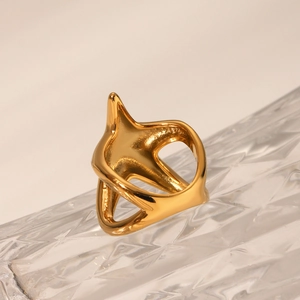 Detail of 18K gold stainless steel starfish ring with polished geometric abstract shapes