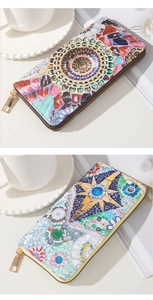 Detail of bohemian mosaic print leather long wallets with premium gold metal zippers