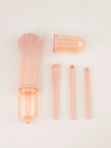 Detail of 4-in-1 portable pink makeup brush set with soft bristles and storage cap