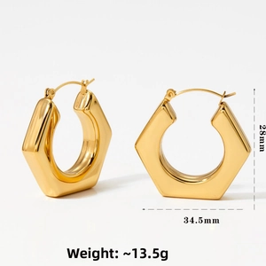 Detail view of 28mm gold hollow hexagonal earrings with weight and size measurements