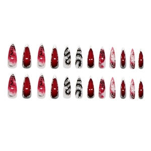 Dark goth stiletto press on nails with red gradient and silver centipede patterns