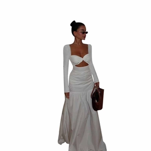 White long sleeve hollow out A-line maxi dress with twist front and pleated waist detail