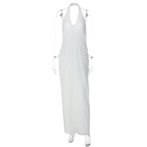 Detail of white halter neck maxi dress featuring elegant pleated mesh and a backless design