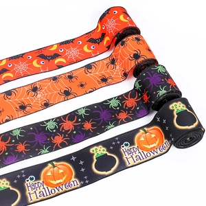 Halloween ribbons set with colorful spider, bat, and pumpkin prints for party DIY crafts