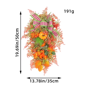 Autumn pumpkin wreath with plaid bow and red berries, measuring 50cm by 35cm