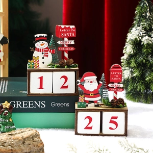 Christmas wooden countdown calendar with Santa and snowman figures on a red background