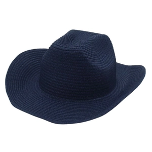 Detail of navy blue woven straw cowboy hat with a wide curved brim and pinched crown