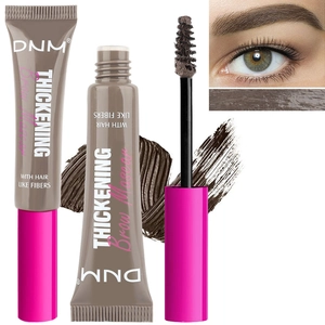 Detail of thickening brow mascara brush showing hair-like fibers for a natural look
