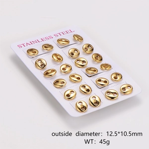 24 pieces of golden stainless steel pig nose stud earrings displayed on a card
