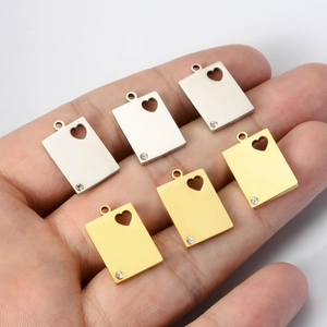 Stainless steel rectangular pendants with heart cutout and crystal in gold and silver