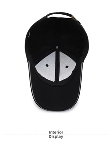 Detail shot of the black baseball cap interior with adjustable metal buckle and lining