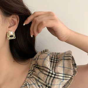 Elegant geometric square gold earrings with white pearl inlay and chain texture trim