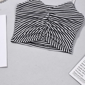 Detailed view of striped ribbed fabric with drawstring shirred bust design on crop top