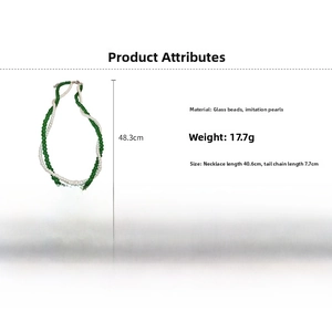 Detail view of pearl and glass bead necklace with chain length measurements 40.6cm and 7.7cm