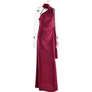 Detail of burgundy one-shoulder satin dress showing fabric texture and slim fit design