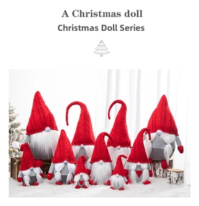Close-up of Christmas gnomes with red knit hats and white faux fur beards for holiday decor