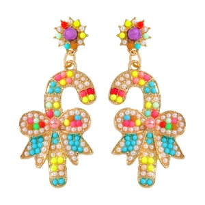 Detail of candy cane drop earrings with colorful beads and a gold bow for Christmas