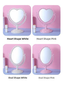 Close-up of European retro vanity mirrors in heart and oval shapes with floral carvings